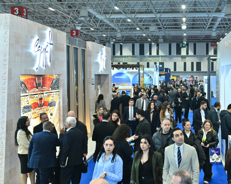 International industry professionals meeting at exhibitor stands at the EMITT tourism fair